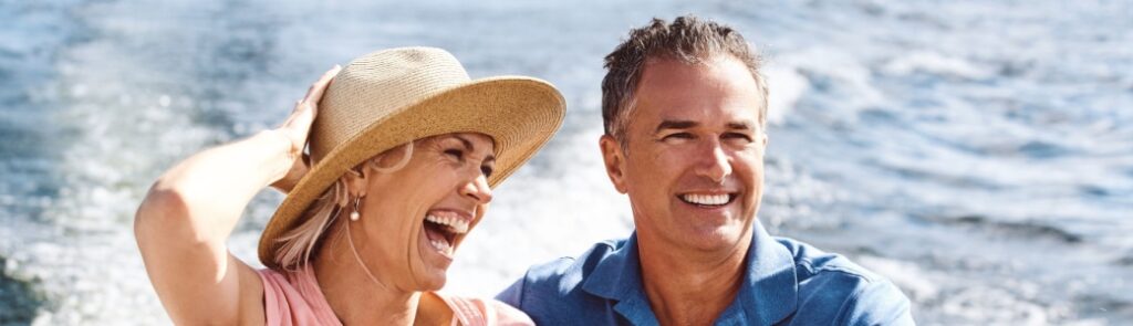 A couple on a yacht cruise.